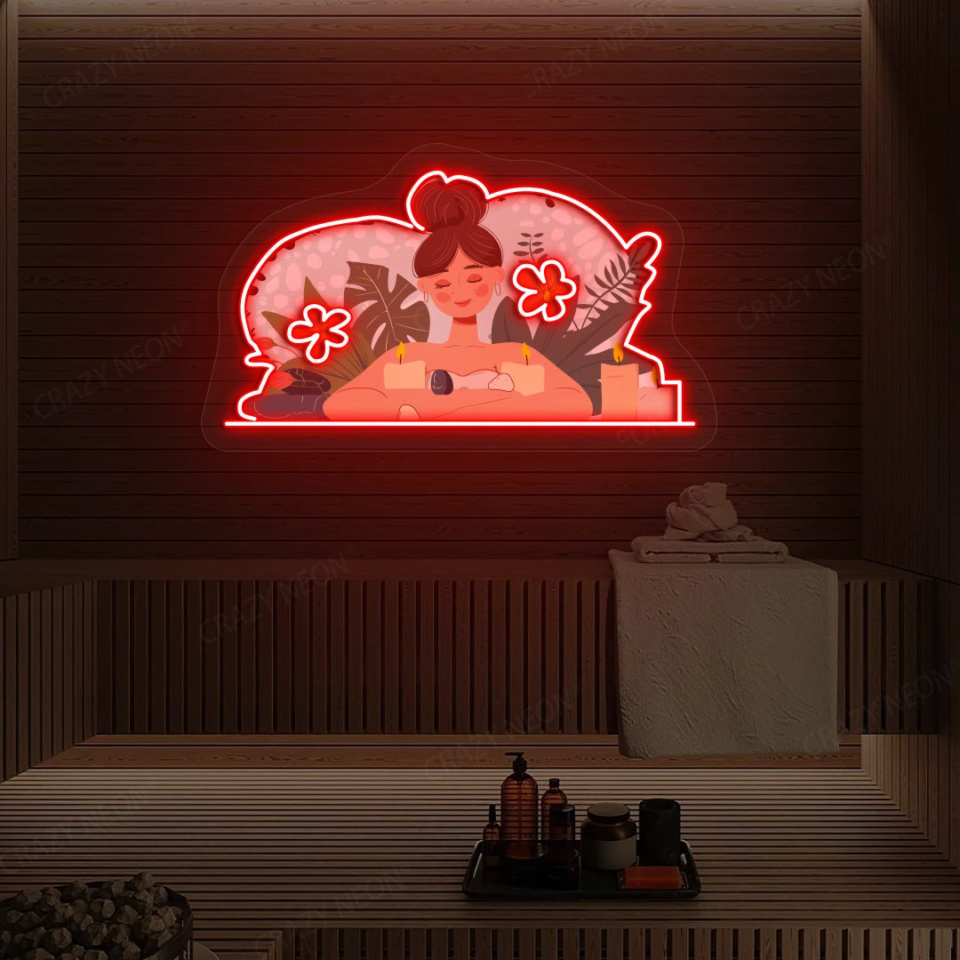 Aromatherapy Relaxation Neon Artwork lighting up in red color on a wooden spa wall