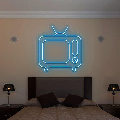 ice blue retro tv vintage neon sign mounted on a wall