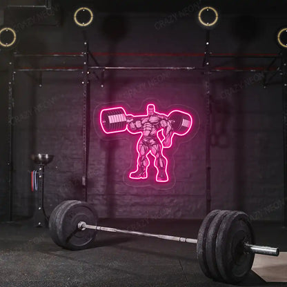 pink bodybuilder power flex gym neon artwork mounted on a wall