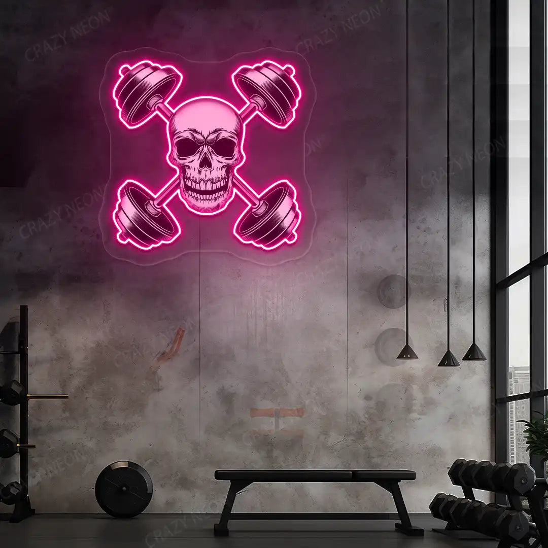 pink skull cross dumbbell gym neon artwork mounted on a wall