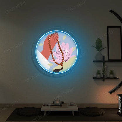 Lotus Japa Neon Artwork lighting up in iceblue color in a yoga room