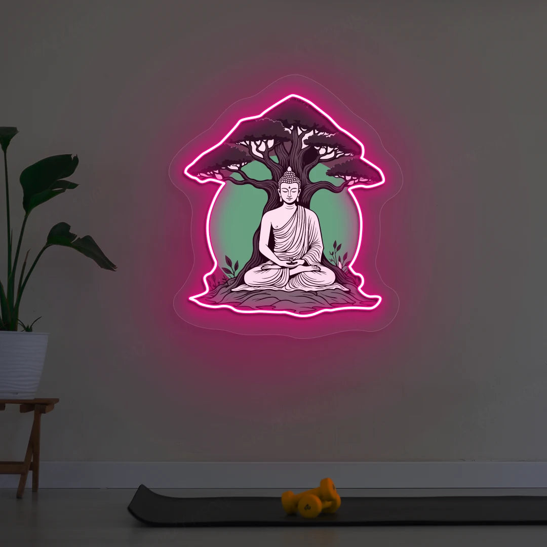 Buddha under Bodhi Neon Artwork lighting up in Pink color in room 