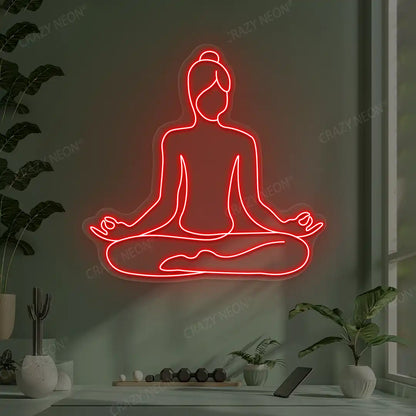 Swastikasana Contour Yoga Neon Sign lighting up in red color in a yoga room