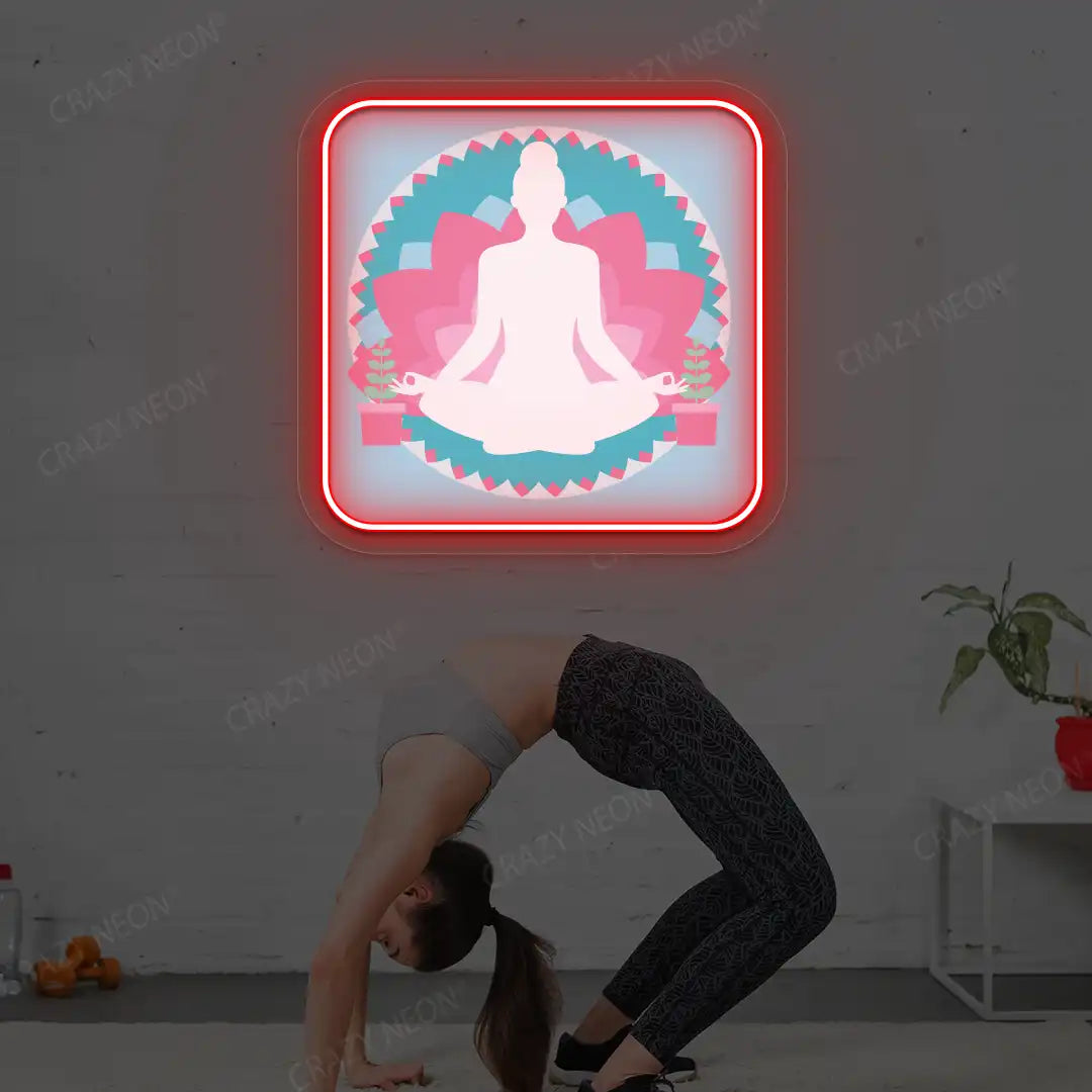 Padmasana Mandala Yoga Neon Artwork lighting up in red color in a yoga room