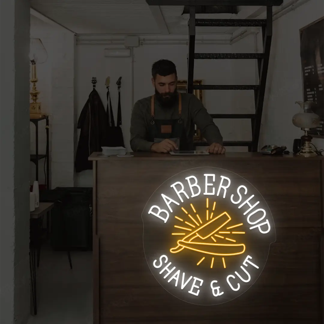 Barber Shop Shave & Cut Neon Sign in White and Orange Colour mounted on wall