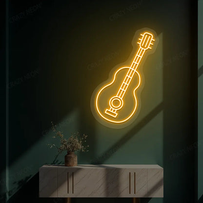 orange acoustic guitar neon sign mounted on a wall