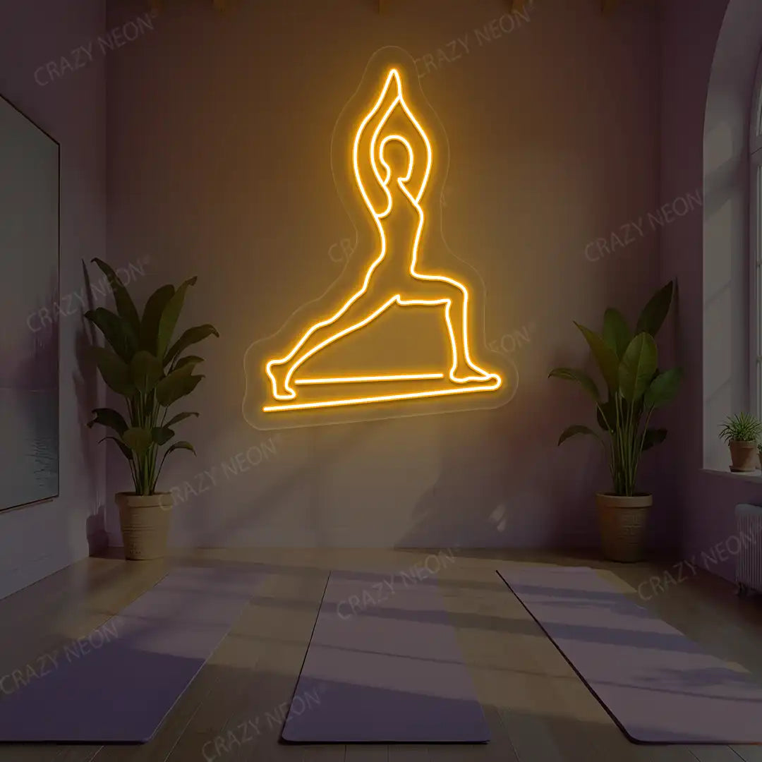 Virabhadrasana I Yoga Neon Sign lighting up in orange color in a yoga room