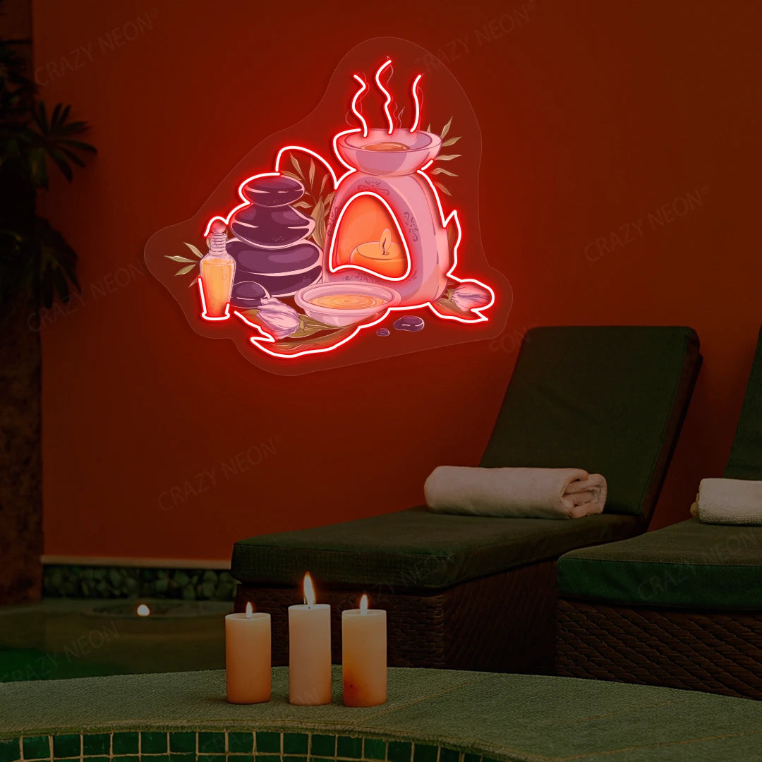 Spa Stones & Aromatherapy Neon Artwork lighting up in red color on a spa wall