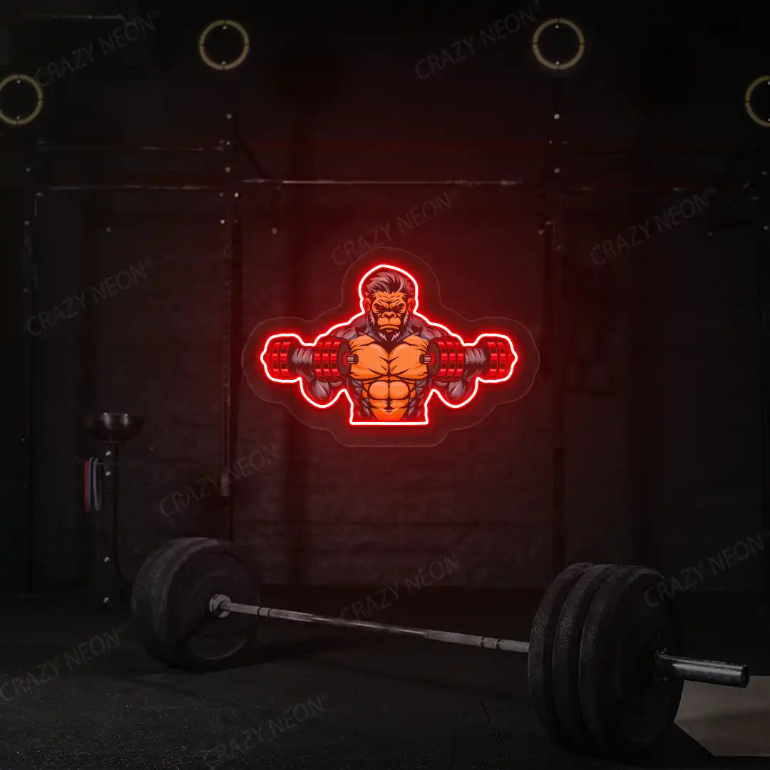 red monkey workout gym neon artwork mounted on a wall