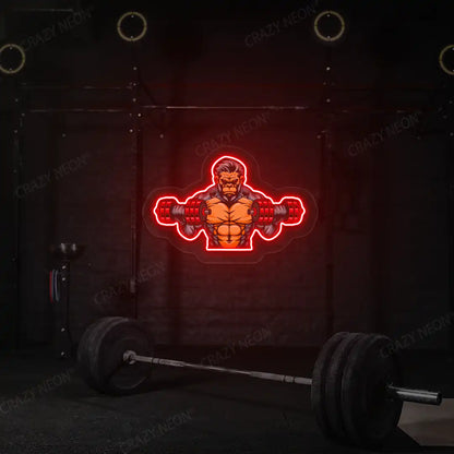 red monkey workout gym neon artwork mounted on a wall