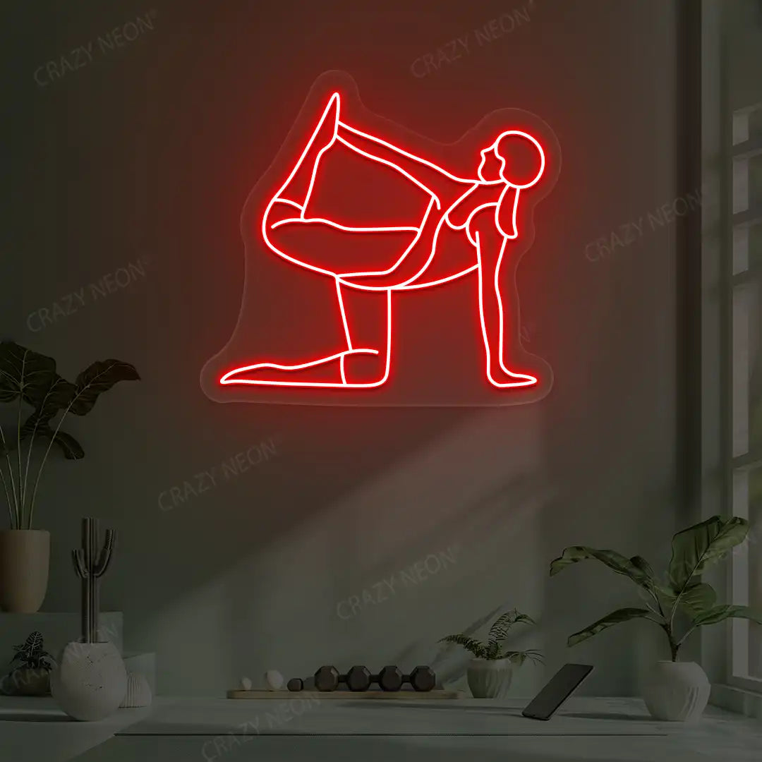 Ardha Dhanurasana Yoga Neon Sign glowing in red color in a yoga room