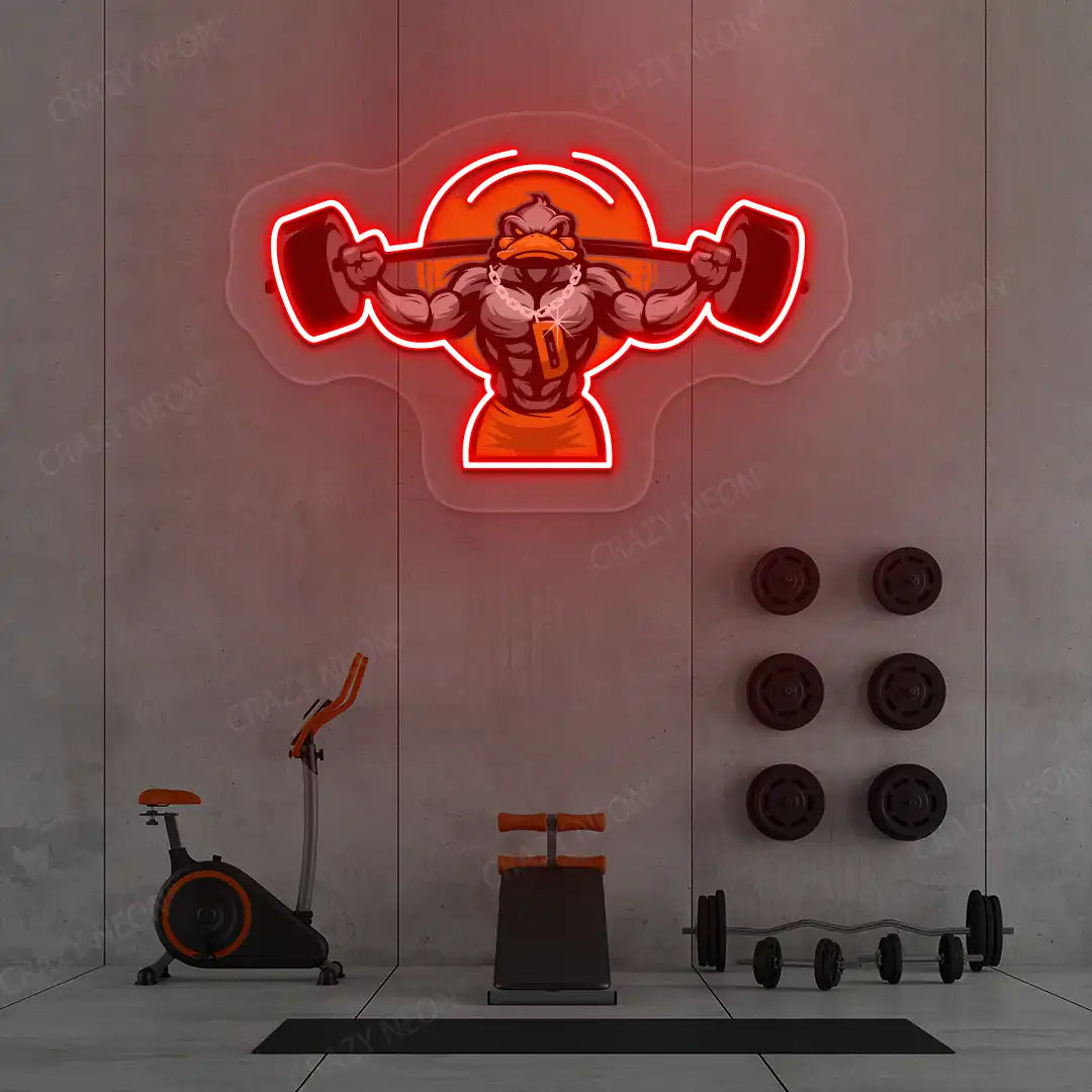 red muscular duck powerlifting gym neon artwork mounted on a wall