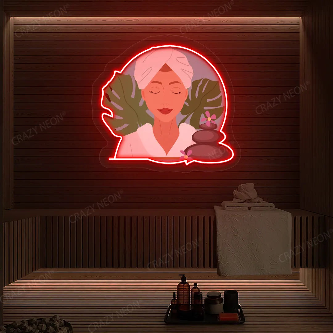 Zen Facial Spa Neon Artwork lighting up in red color on a wooden spa wall