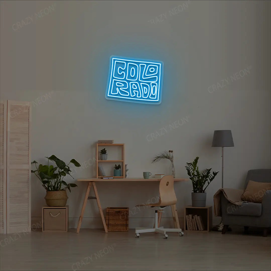 COLORADO Map Neon Sign lighting up in iceblue color in a room