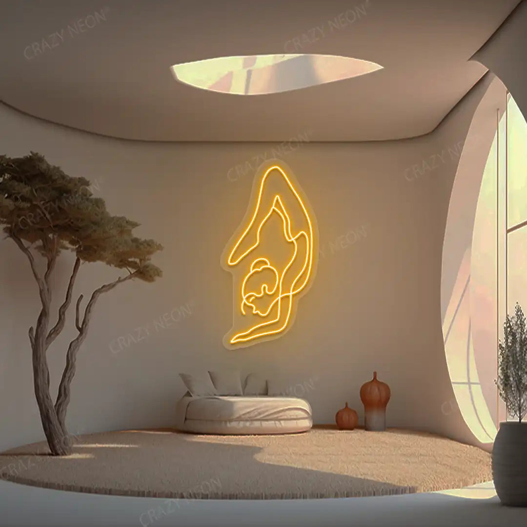 Purna Vrishchikasana Yoga Neon Sign glowing in orange color in a yoga room
