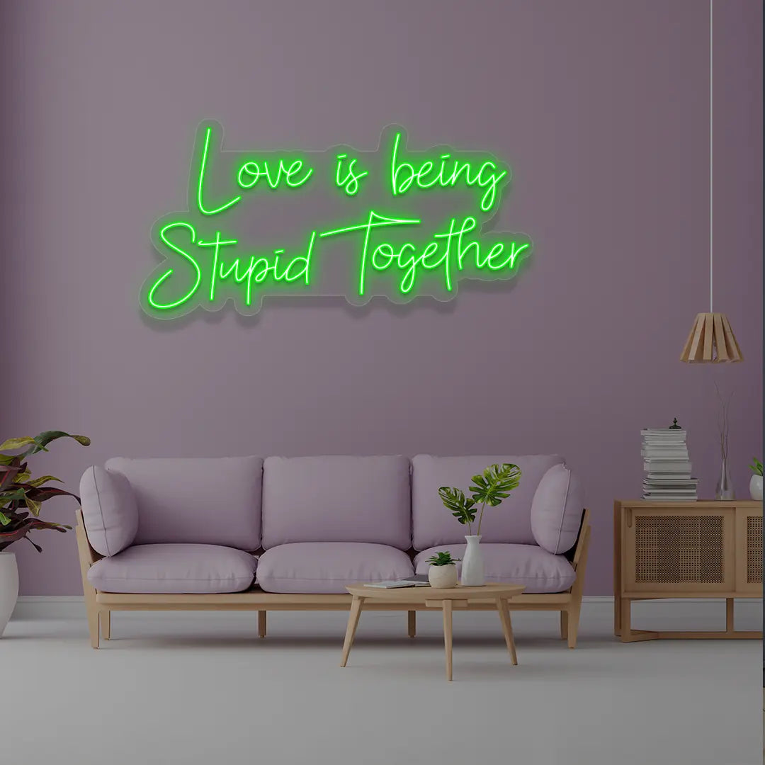 Love Is Being Stupid Together Neon Sign in Green Color 