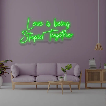 Love Is Being Stupid Together Neon Sign in Green Color 
