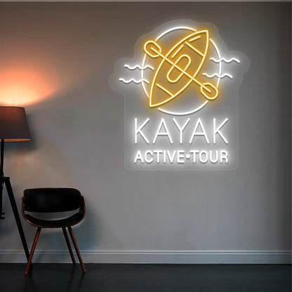 orange and white kayak active tour neon sign mounted on a wall