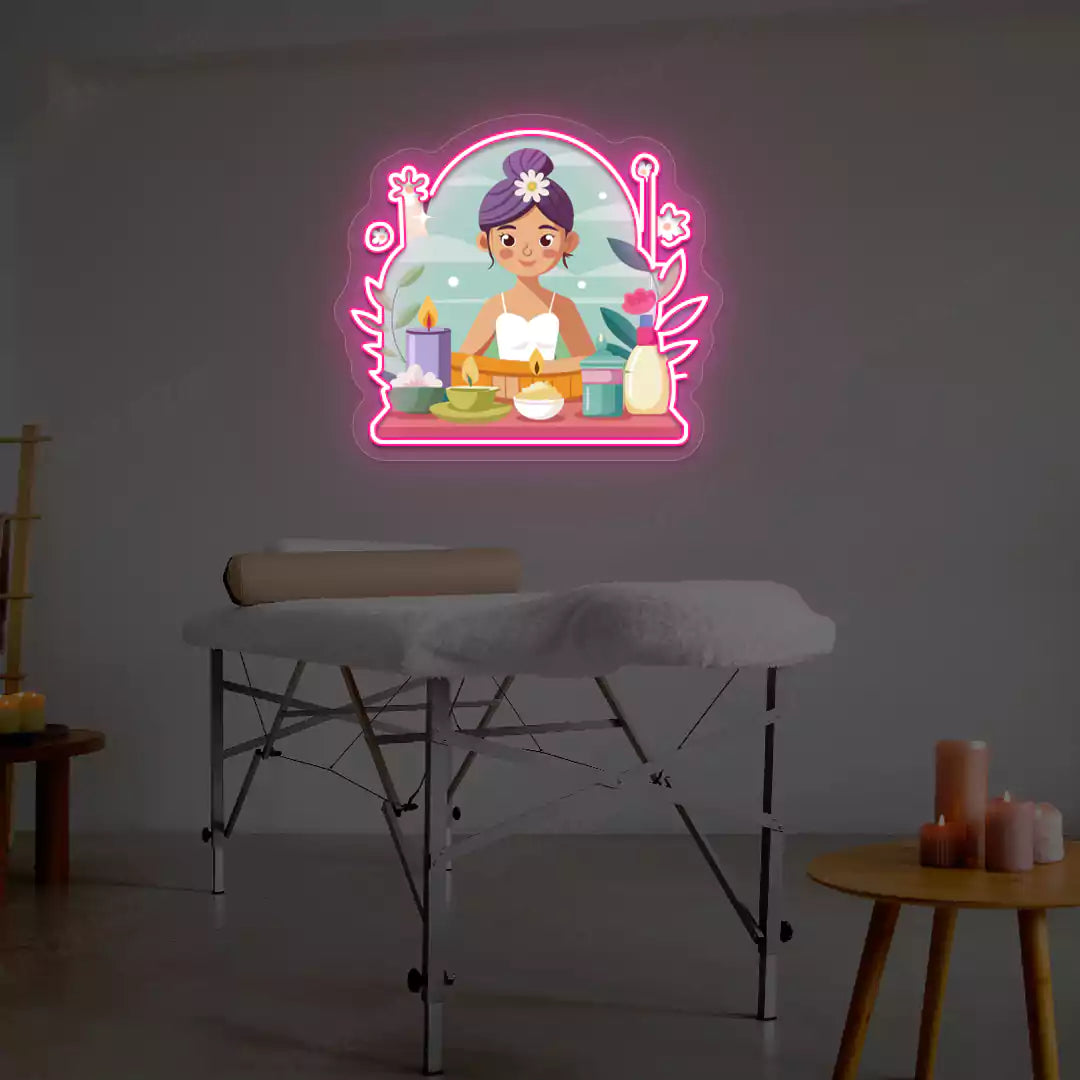 Spa Girl Neon Artwork lighting up in pink color on a spa wall