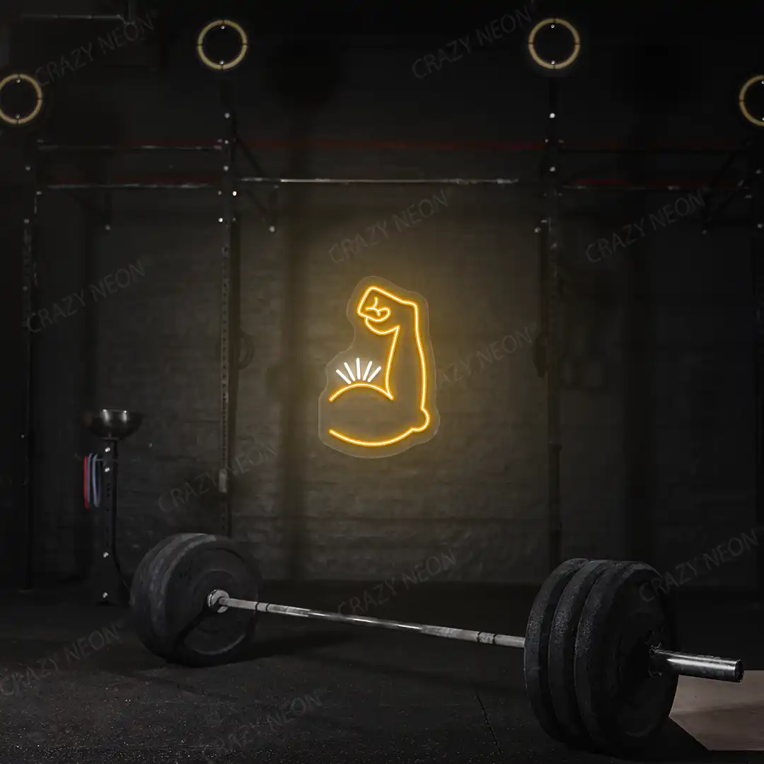 orange and white bicep pump neon sign mounted on a wall