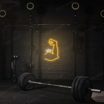 orange and white bicep pump neon sign mounted on a wall