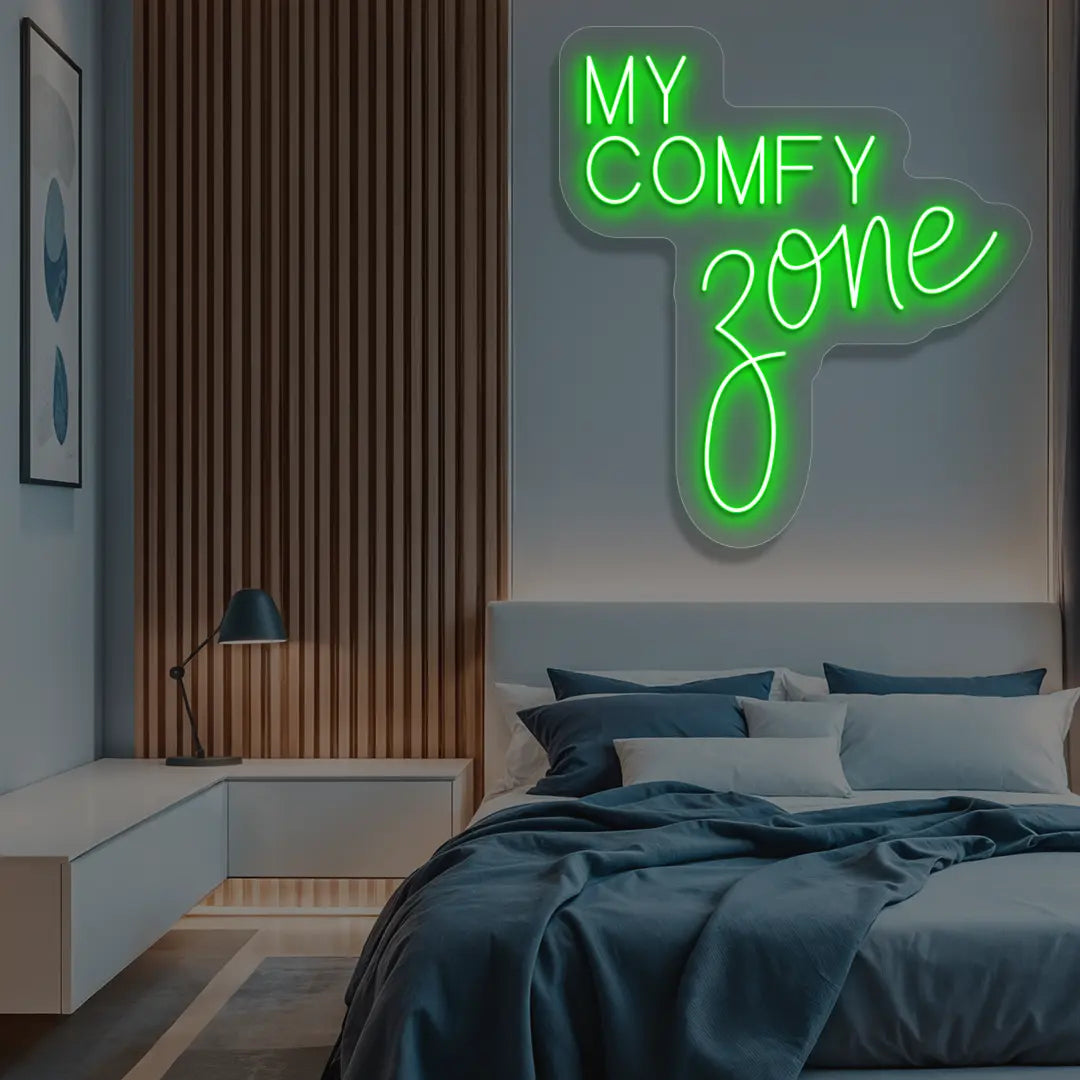 green my comfy zone neon sign mounted on a wall