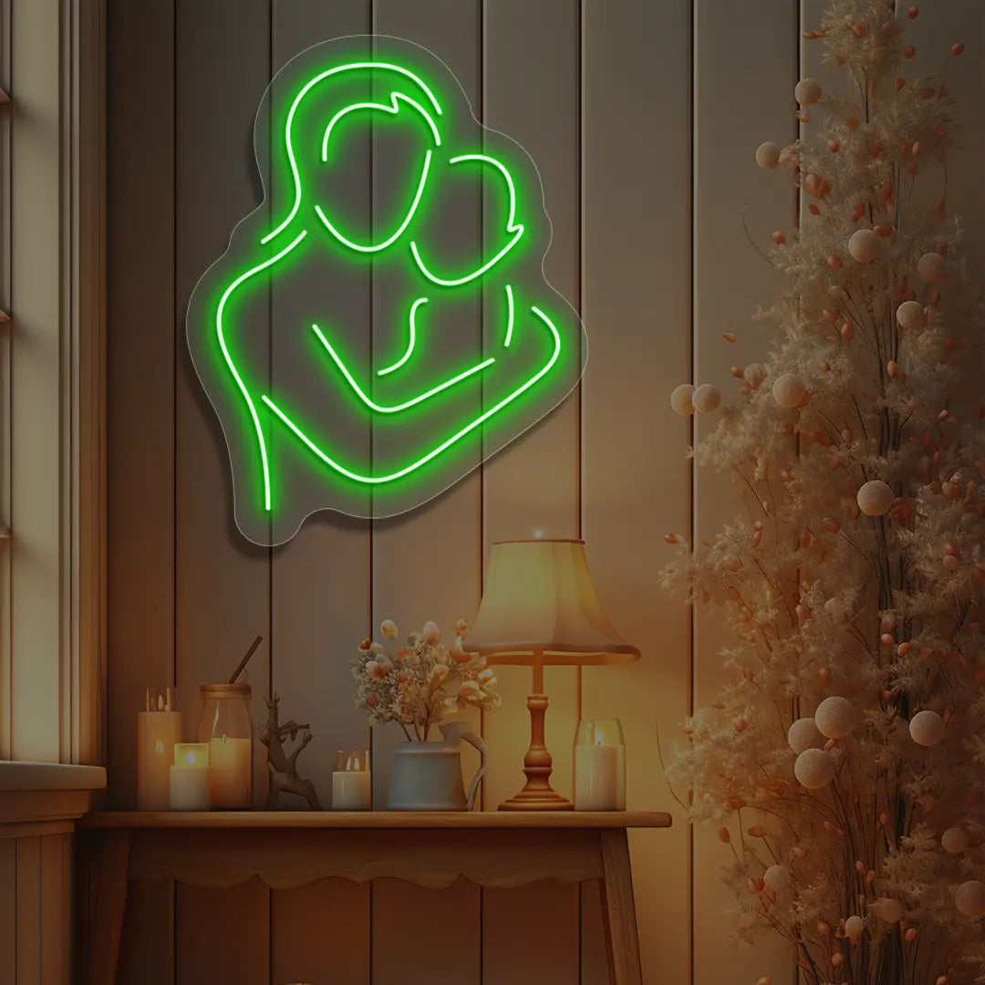 green mamas hug neon sign mounted on a wall