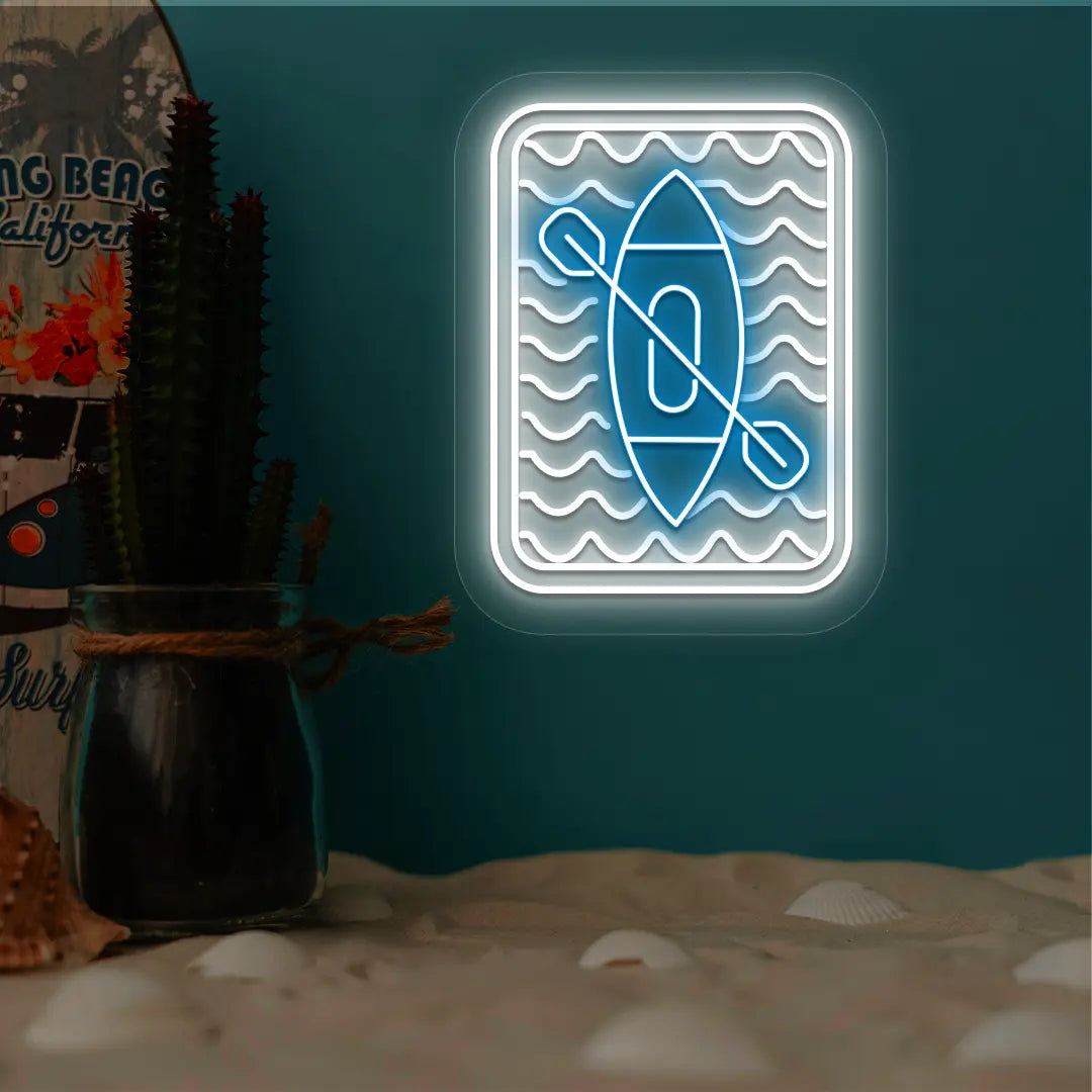 ice blue and white kayak ocean waves neon sign mounted on a wall