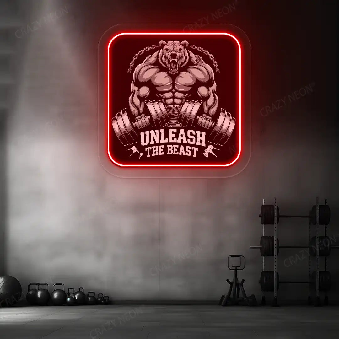 red unleash the beast bear neon artwork mounted on a wall