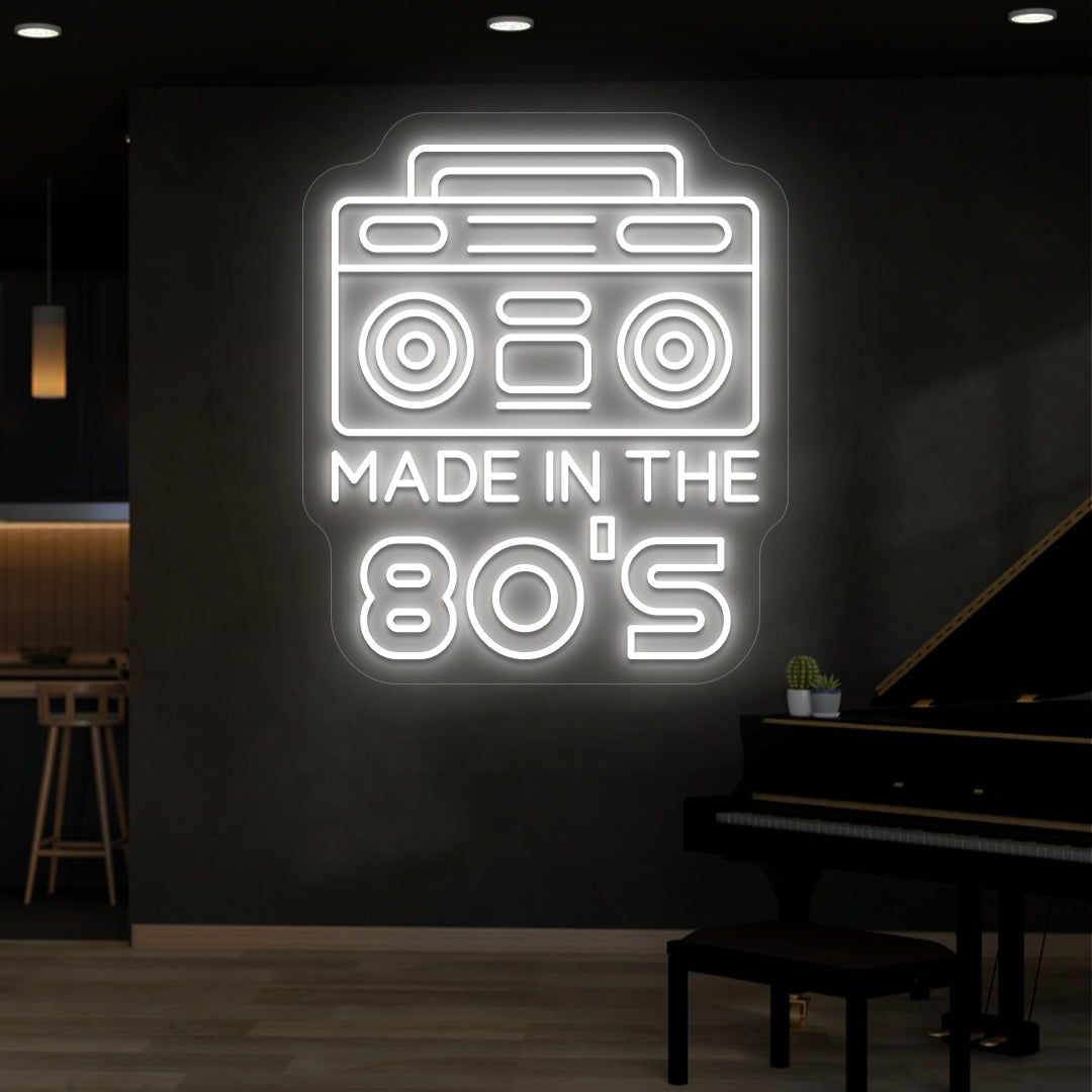 white made in the 80s stereo vintage neon sign mounted on a wall