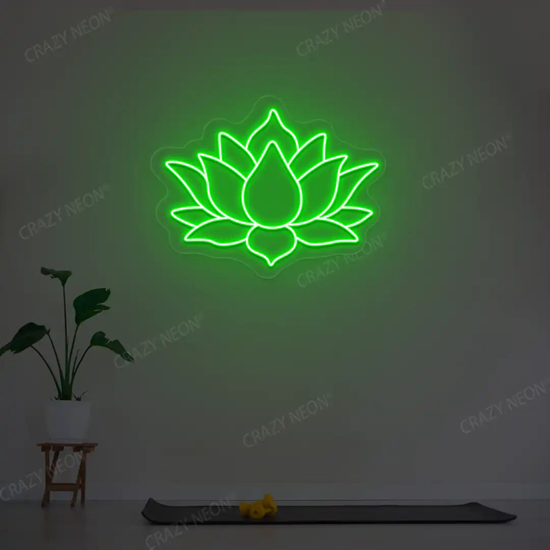 Lotus Flower Neon Sign lighting up in green color in a yoga room