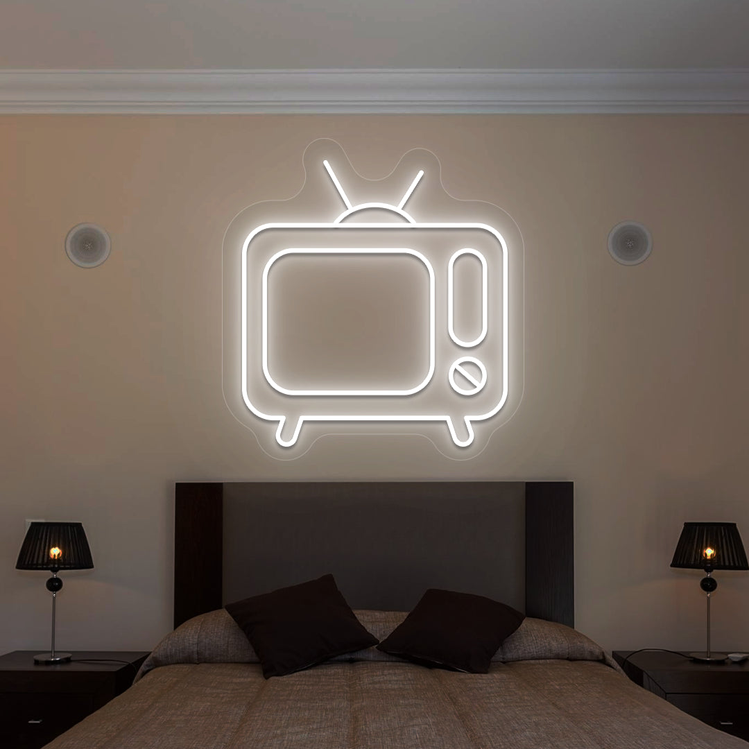 white retro tv vintage neon sign mounted on a wall