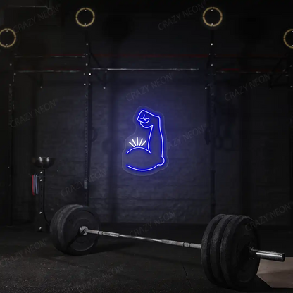 blue and white bicep pump neon sign mounted on a wall