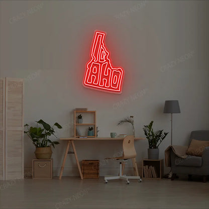 IDAHO Map Neon Sign lighting up in red color in a room
