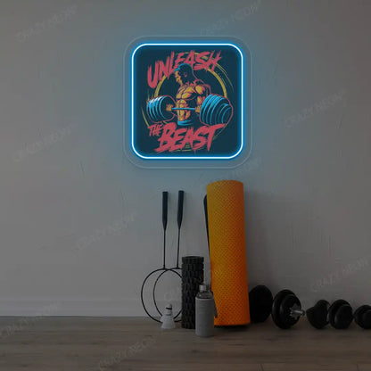 ice blue unleash the beast gym neon artwork mounted on a wall
