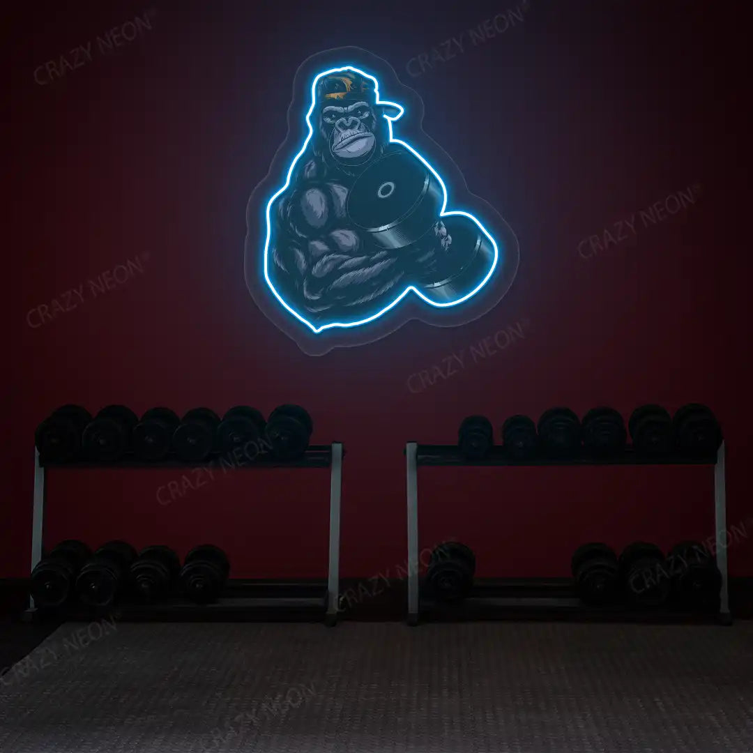 ice blue gorilla dumbbell lifting gym neon artwork mounted on a wall