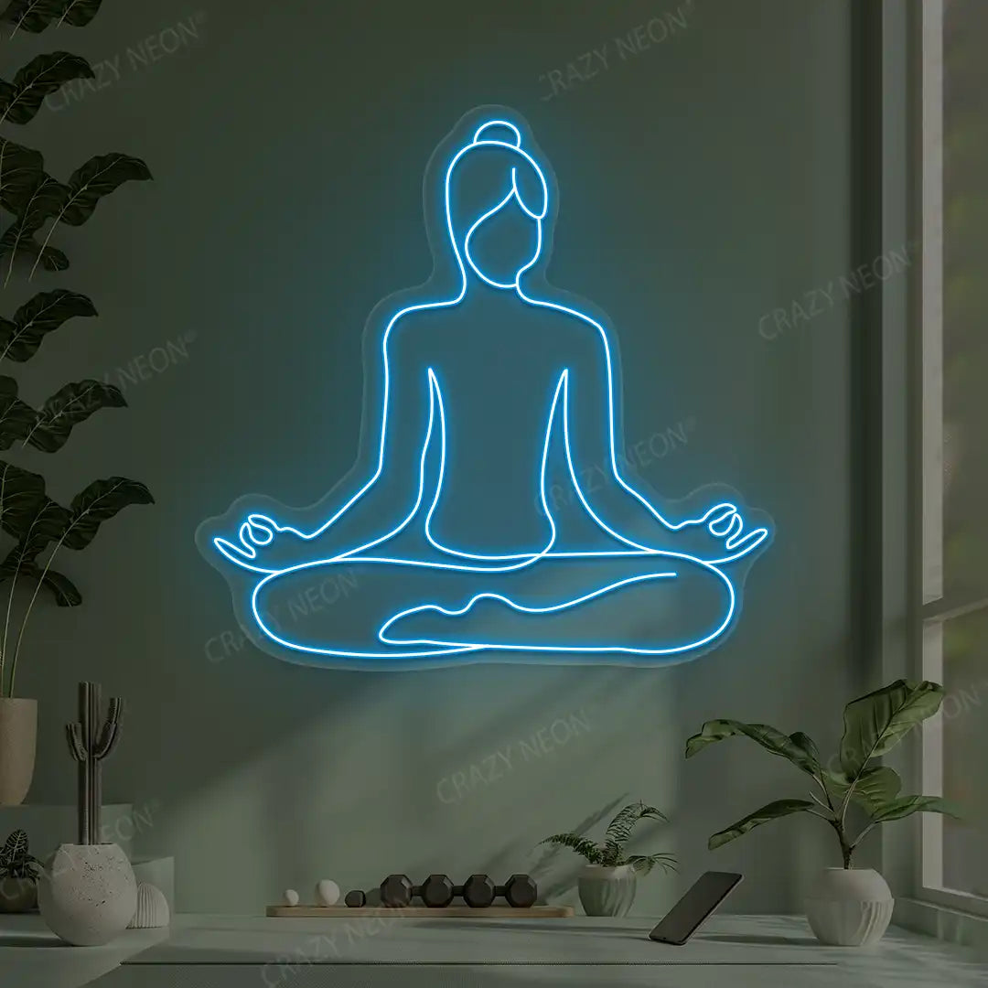 Swastikasana Contour Yoga Neon Sign lighting up in ice blue color in a yoga room