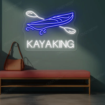 blue and white kayaking boat neon sign mounted on a wall