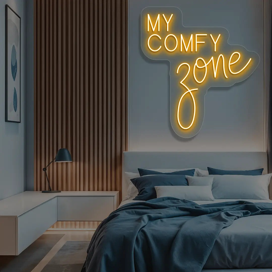 orange my comfy zone neon sign mounted on a wall
