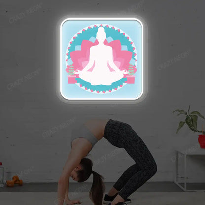 Padmasana Mandala Yoga Neon Artwork lighting up in white color in a yoga room
