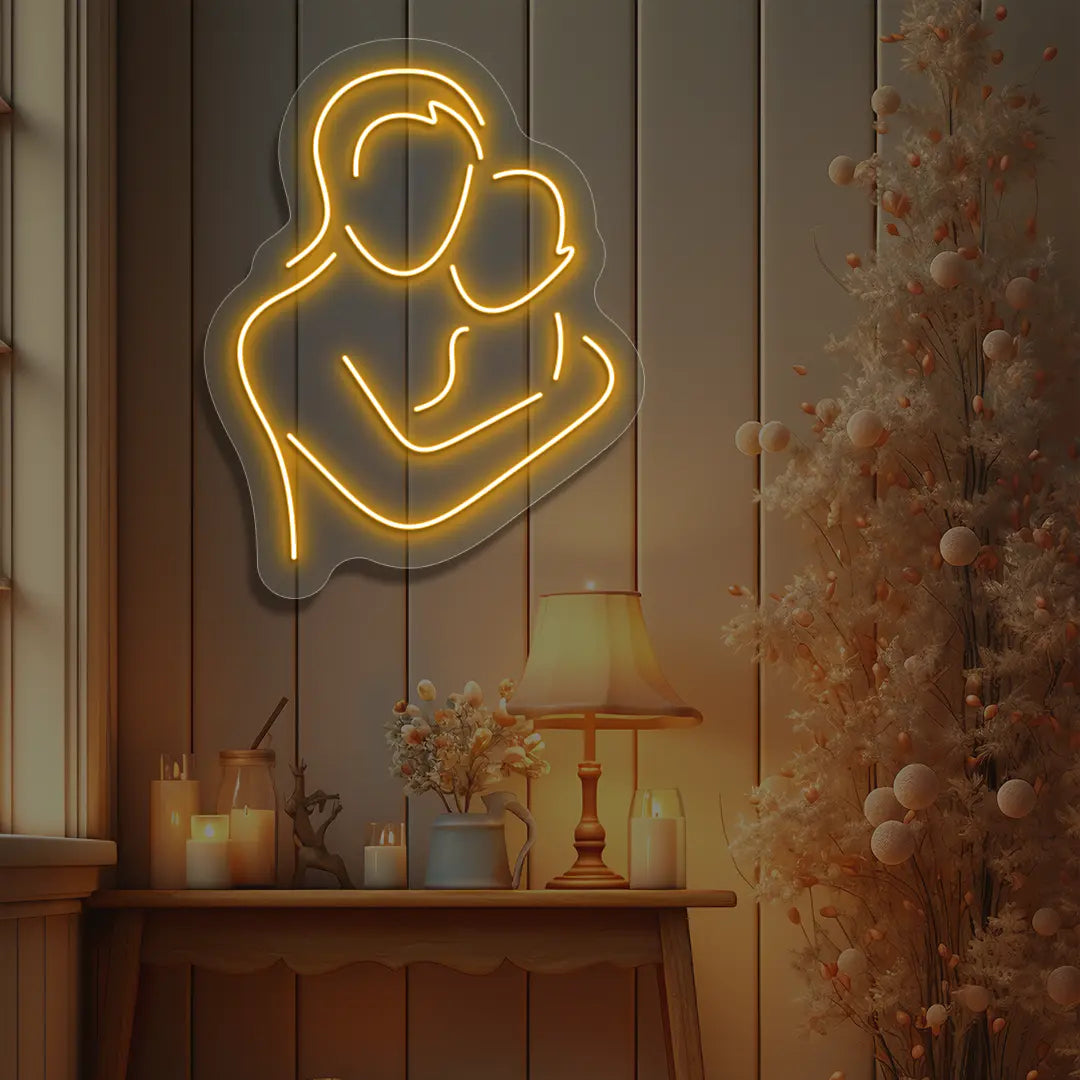 orange mamas hug neon sign mounted on a wall