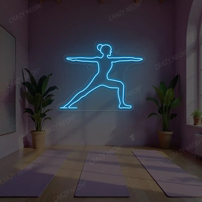 Virabhadrasana II Yoga Neon Sign lighting up in ice blue color in a yoga room