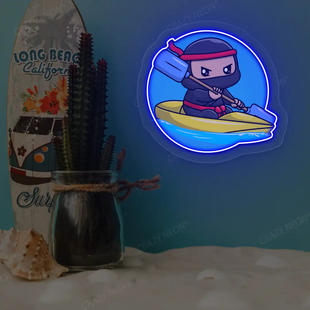 blue ninja kayaking neon artwork mounted on a wall