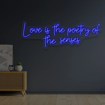 Love Is The Poetry Of The Senses Neon Sign in blue Color