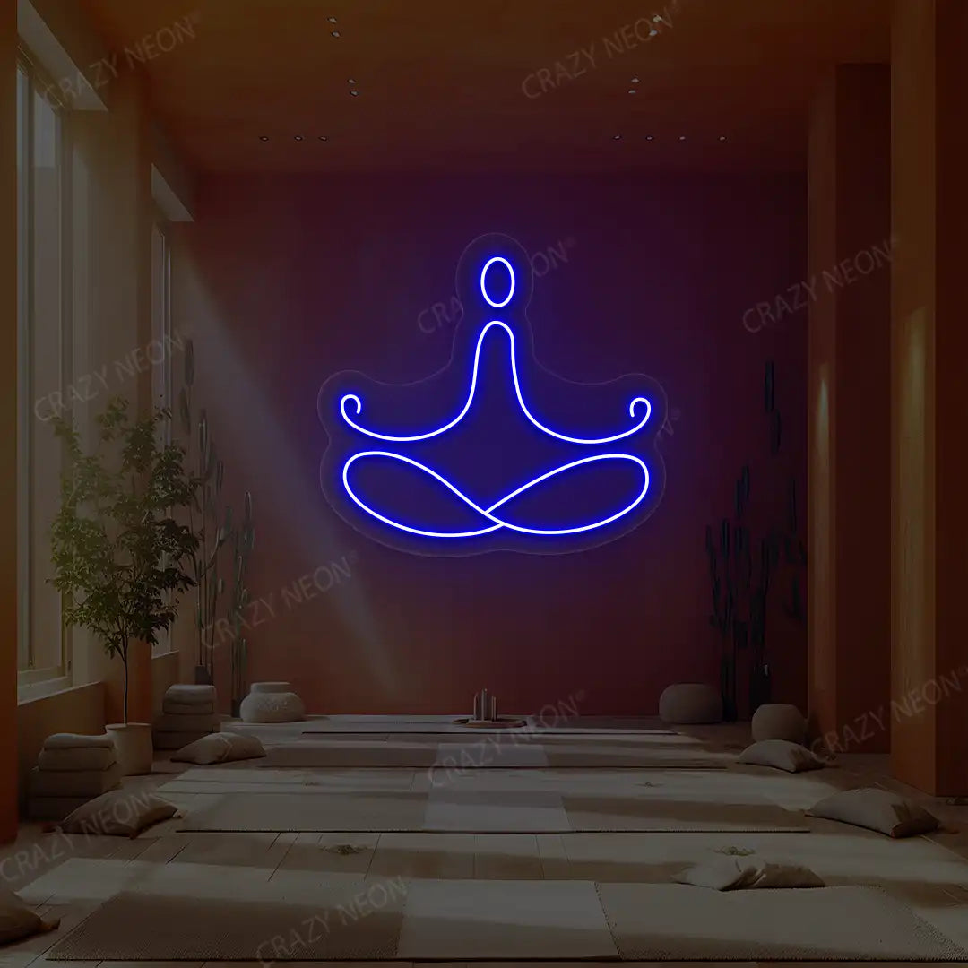 Padmasana Yoga Neon Sign lighting up in blue color in a yoga room