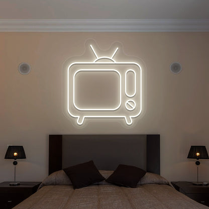 warm white retro tv vintage neon sign mounted on a wall
