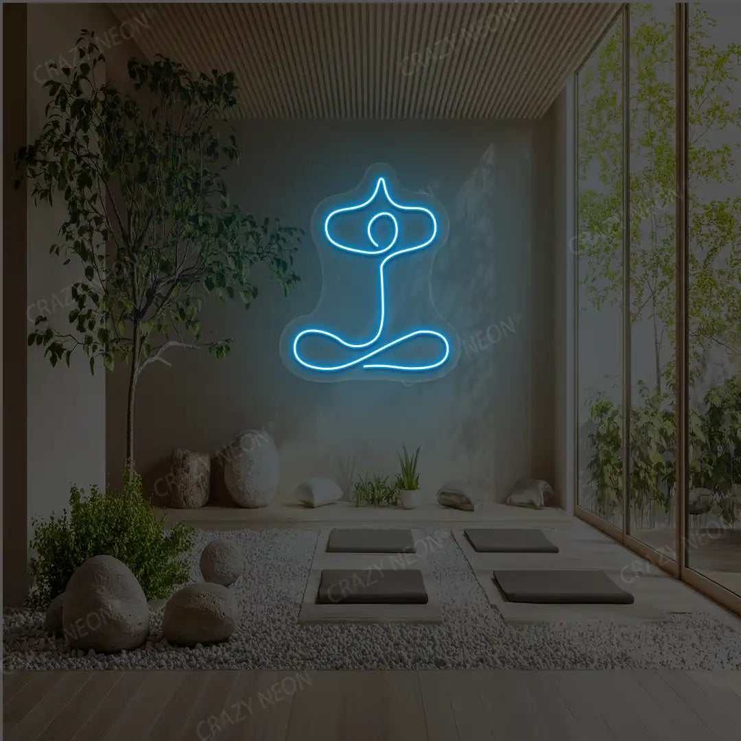 Sukhasana With Arms Raised Contour Yoga Neon Sign glowing in ice blue color in a yoga room