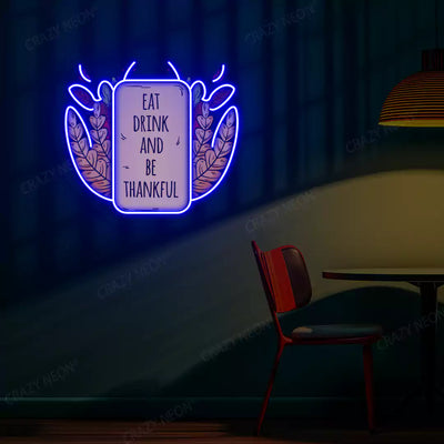 Eat drink and be thankful neon sign in blue
