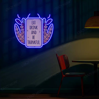 Eat drink and be thankful neon sign in blue
