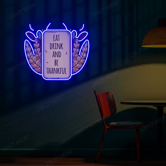 Eat drink and be thankful neon sign in blue